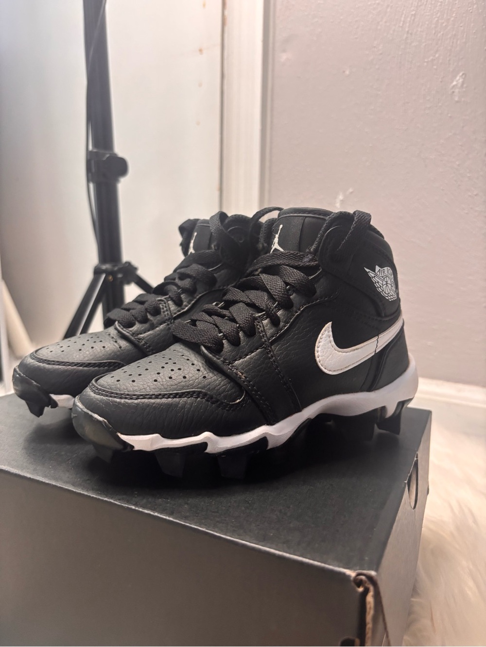 Jordan Kids Black and White High-Top Cleat Sneakers